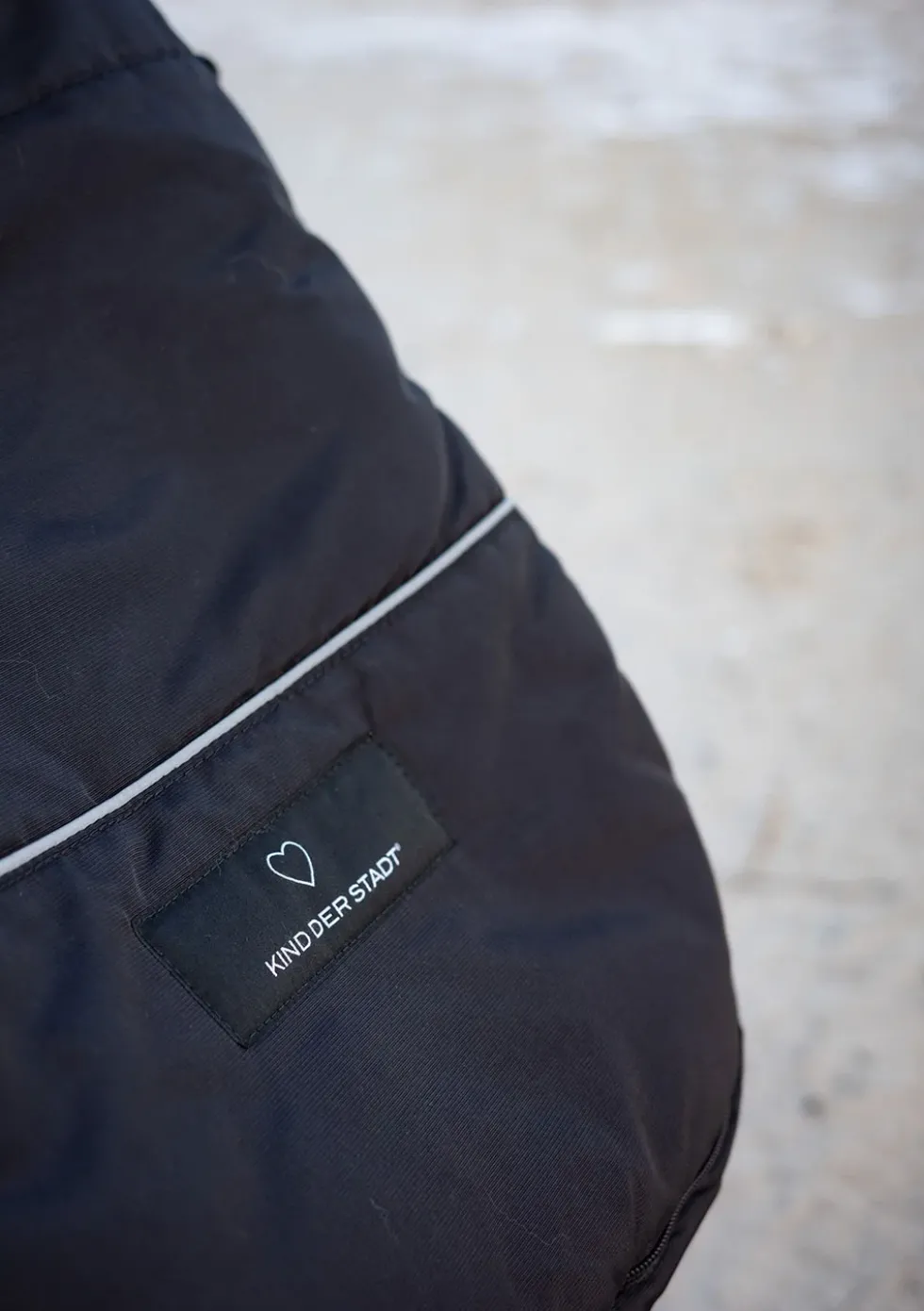 Premium Lammfell-Fußsack midnight black